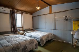 A bed or beds in a room at ojirotomarlo