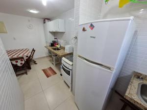 Nhà bếp/bếp nhỏ tại Jardins do Atlântico