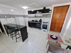 Nhà bếp/bếp nhỏ tại Luxor Tambaú
