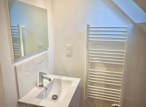 Kúpeľňa v ubytovaní Appartement rénové proche Gare