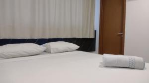 Cama o camas de una habitación en Paradise Beach Flat's