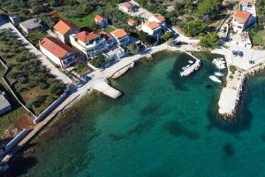 an aerial view of a resort with boats in the water at Apartment Kukljica 8277c in Kukljica