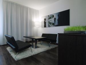 A seating area at arte Hotel Linz
