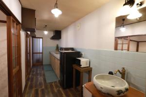 a bathroom with a sink and a sink at Kyo KOZO Kitano Tenjin - Vacation STAY 89906 in Kyoto