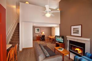 a living room with a couch and a fireplace at Residence Inn by Marriott Portland South-Lake Oswego in Lake Oswego