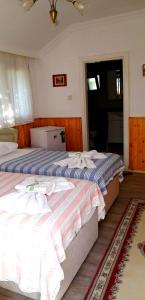 Postel nebo postele na pokoji v ubytování Jasmin Apart Otel