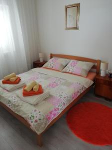 Postel nebo postele na pokoji v ubytování Apartman Zana