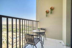 Balkón nebo terasa v ubytování Tranquil 2BR with Assistant Room at Mesk 1 Midtown Dubai Production City by Deluxe Holiday Homes