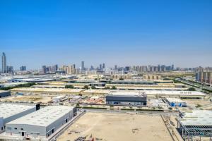 Nespecifikovaný výhled na destinaci Dubaj nebo výhled na město při pohledu z apartmánu