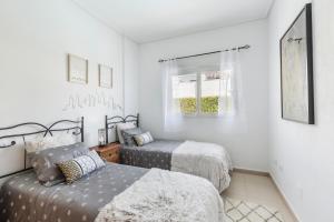 Postel nebo postele na pokoji v ubytování Casadeluxe Villa La Torre Lenguado