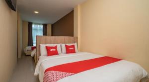 Postel nebo postele na pokoji v ubytování Hotel The Island