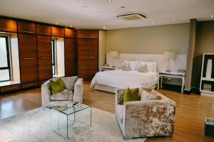 Katil atau katil-katil dalam bilik di Tredenham Boutique Hotel