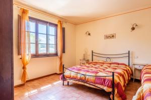 Postel nebo postele na pokoji v ubytování Casolare dei Fiori - Mughetto
