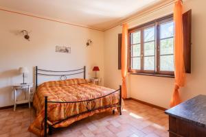 Voodi või voodid majutusasutuse Casolare dei Fiori - Mughetto toas