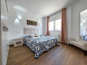 Postel nebo postele na pokoji v ubytování Apartamentos El Pozo