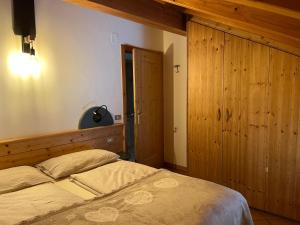 A bed or beds in a room at Al Truciolo