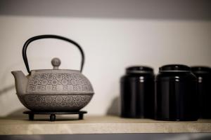 Tiện nghi pha trà/cà phê tại Gîte La Petite Ourse - gîte de charme citadin