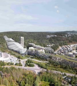 an aerial view of a city with a building at Thon Hotel Snø in Lorenskog