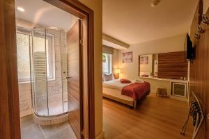 Postel nebo postele na pokoji v ubytování Hotel Schwarzbachtal Hideaway