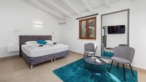 Ένα ή περισσότερα κρεβάτια σε δωμάτιο στο Villa Hardy by Villas Holiday +32 φωτογραφίες