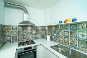 Kuchyň nebo kuchyňský kout v ubytování Apartment Radovan