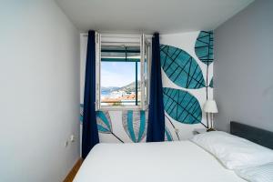 Postel nebo postele na pokoji v ubytování Apartment Radovan