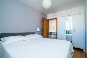 Postel nebo postele na pokoji v ubytování Apartment Radovan