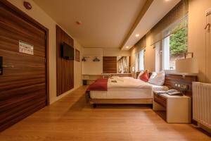 Postel nebo postele na pokoji v ubytování Hotel Schwarzbachtal Hideaway