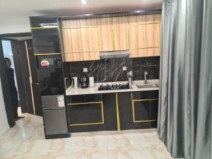 Kuchyň nebo kuchyňský kout v ubytování Suna' a Home Bonapriso