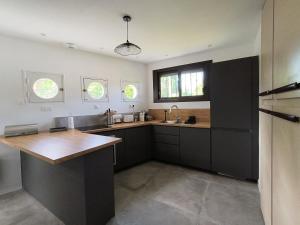 Køkken eller tekøkken på La maison des rives de Saint Brice