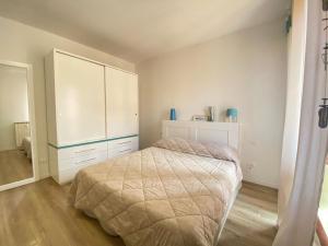 Postel nebo postele na pokoji v ubytování Vittoria Apartament