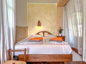 Ένα ή περισσότερα κρεβάτια σε δωμάτιο στο Tropical Studio +47 φωτογραφίες