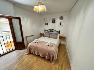 Postel nebo postele na pokoji v ubytování Al hilo de Landaluce