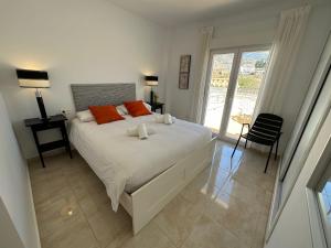 Posteľ alebo postele v izbe v ubytovaní Nerja Paradise Rentals - Villa Jade + 37 fotografií