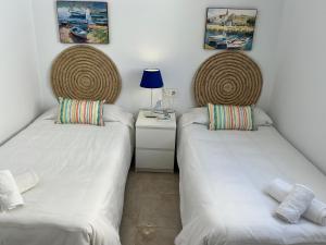 Posteľ alebo postele v izbe v ubytovaní Nerja Paradise Rentals - Villa Jade
