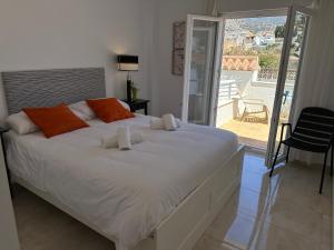 Posteľ alebo postele v izbe v ubytovaní Nerja Paradise Rentals - Villa Jade