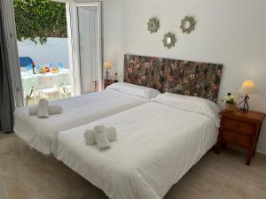 Posteľ alebo postele v izbe v ubytovaní Nerja Paradise Rentals - Villa Jade