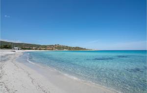 a view of a beach with blue water at 1 Bedroom Pet Friendly Home In Orosei in Orosei