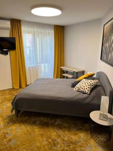 Ένα ή περισσότερα κρεβάτια σε δωμάτιο στο Morena 206