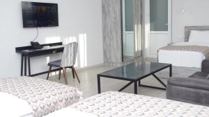 Voodi või voodid majutusasutuse Aventus Hotel toas