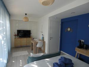 Télévision ou salle de divertissement dans l'établissement B&B Badhuis