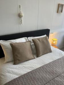 Un ou plusieurs lits dans un hébergement de l'établissement B&B Badhuis