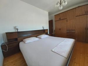 Postel nebo postele na pokoji v ubytování Apartment Laura