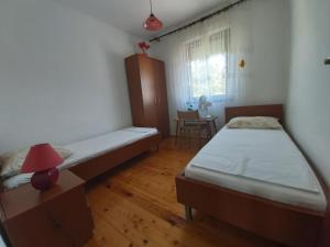 Krevet ili kreveti u jedinici u okviru objekta Apartment Laura