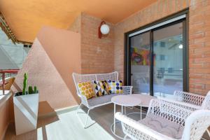 Część wypoczynkowa w obiekcie ApartUP La Concha Beachfront II
