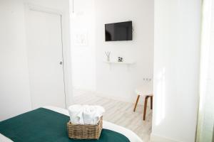TV a/nebo společenská místnost v ubytování Hostal Benalup Atalaya