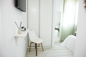 TV a/nebo společenská místnost v ubytování Hostal Benalup Atalaya