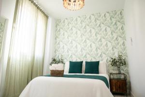 Postel nebo postele na pokoji v ubytování Hostal Benalup Atalaya