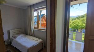 Postel nebo postele na pokoji v ubytování GreenHill - Your Guesthouse in Ubisa