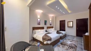 Ένα ή περισσότερα κρεβάτια σε δωμάτιο στο Happy View Inn